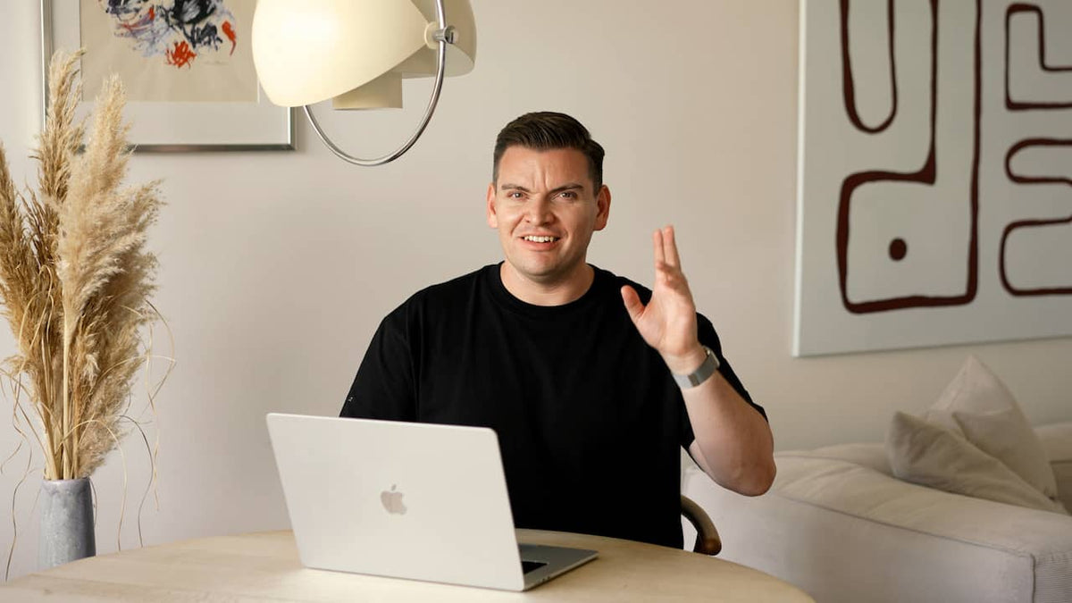 Load video: Product video demonstrating the Union of Two Preset Pack featuring a man in a black t shirt accompanied by screen recorded footage from Adobe Lightroom.